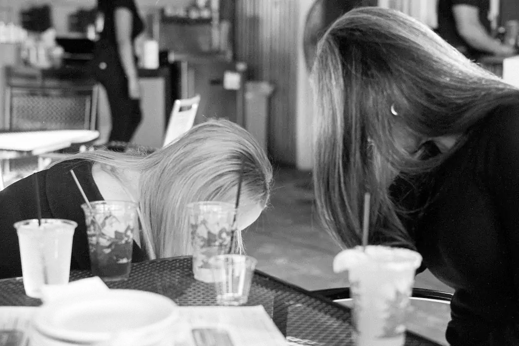 Ladies at dinner. Leica MP. 50mm Summilux. HP5.