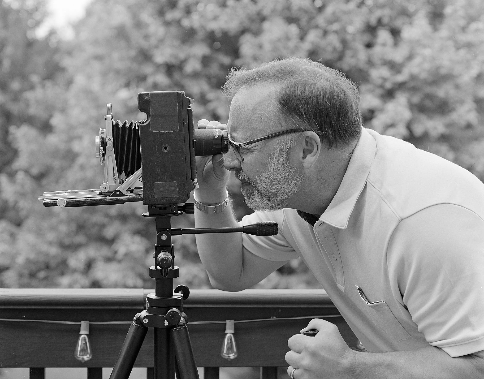 Self-portrait pretending to use the Crown Graphic (2021). Linhof Master Technika.